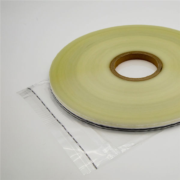 Aftagelig taskeforseglingstape